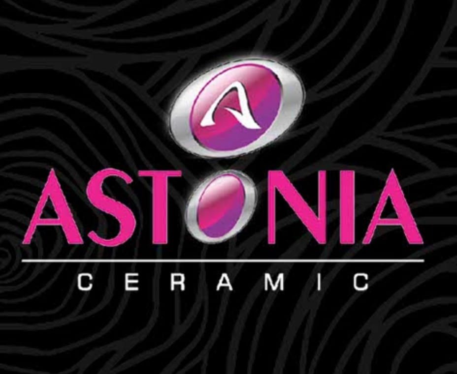 Minimalist home decor items including vases, candles, and artwork arranged on a shelf