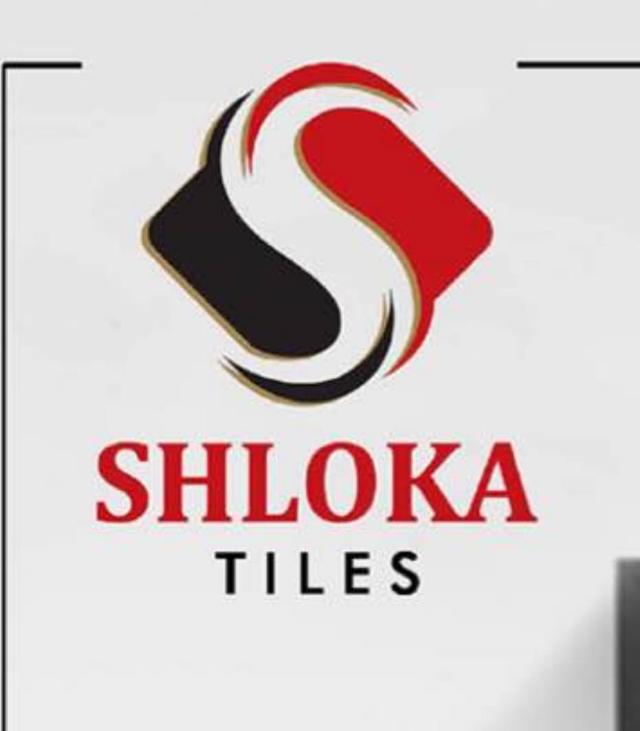 Minimalist home decor items including vases, candles, and artwork arranged on a shelf